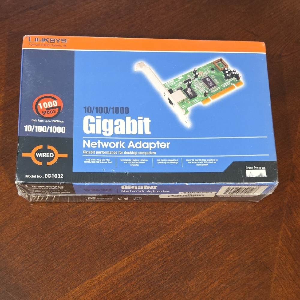 (J25) Linksys Blue and Orange Network Adapter